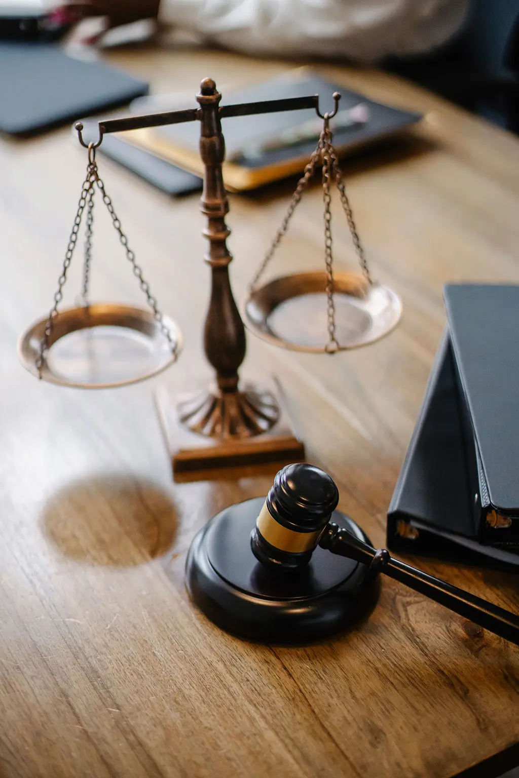 Lawyer organizing documents at elegant desk